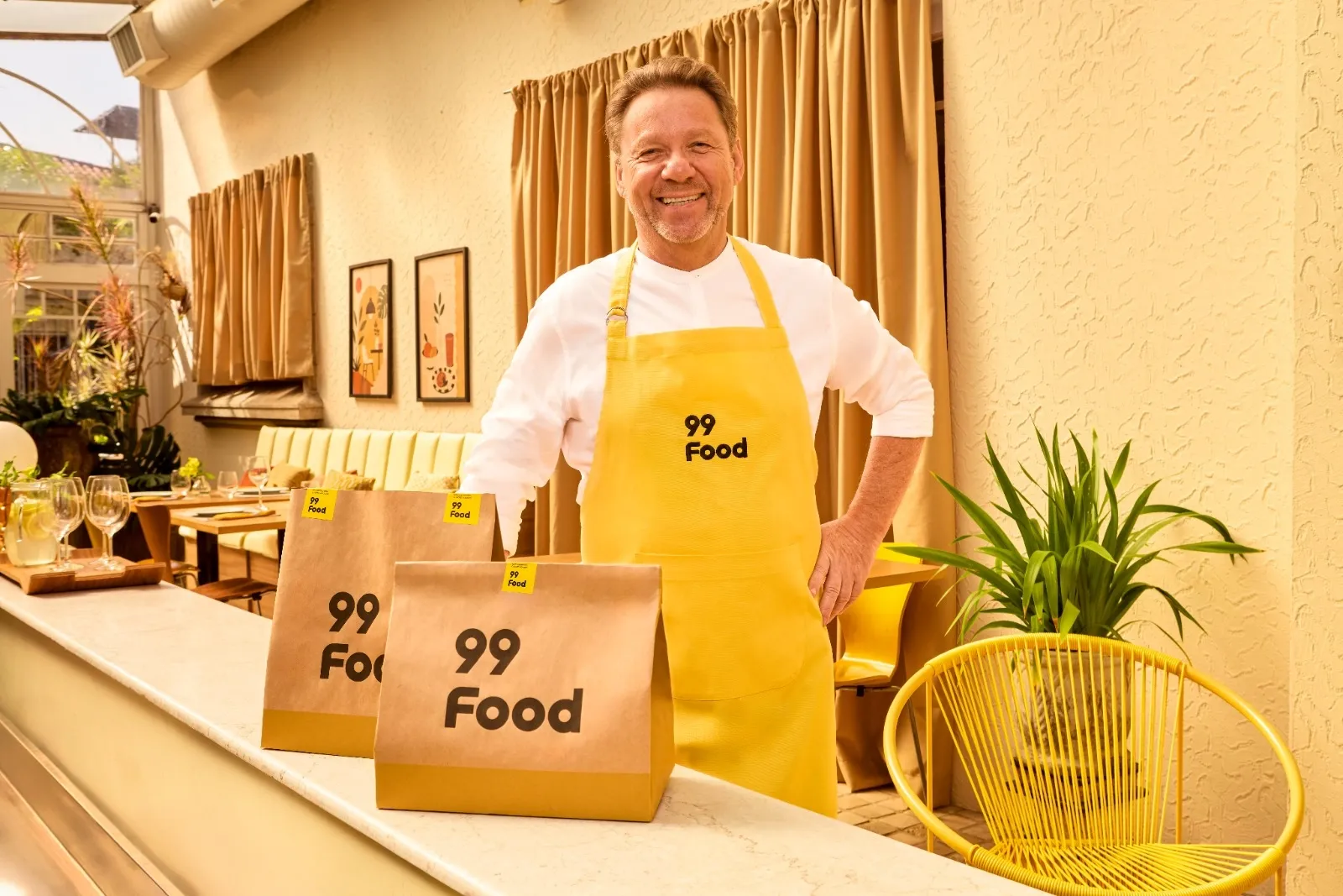 Chef Claude Troisgros é o novo embaixador da 99Food em campanha focada em restaurantes